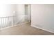 Hallway featuring a banister at 3725 S Nepal St, Aurora, CO 80013