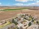 Beautiful aerial view showcases the expansive property with manicured lawns, pool and scenic surroundings at 1324 State Highway 66, Longmont, CO 80504