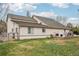 Exterior view of the property showcasing the expansive yard and building details at 1324 State Highway 66, Longmont, CO 80504