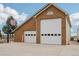 Spacious garage with multiple bays, ideal for car enthusiasts or extra storage at 1324 State Highway 66, Longmont, CO 80504