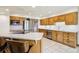 Kitchen boasts light wood cabinets, stainless steel appliances, and plenty of counter space at 1324 State Highway 66, Longmont, CO 80504