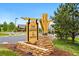 Community sign with rock base and landscaping at 3548 Swabuck Pl, Castle Rock, CO 80109