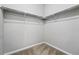 Empty walk-in closet with carpet and rack and shelving system at 3548 Swabuck Pl, Castle Rock, CO 80109