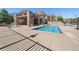 Inviting community pool area with a hot tub and ample space for relaxation and recreation at 9962 W Victoria Pl # 106, Littleton, CO 80127