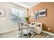 Charming breakfast nook features a cozy bench seat, modern decor, and a sun-drenched window at 16555 Peak Way, Broomfield, CO 80023