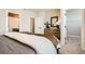 Comfortable main bedroom featuring a walk-in closet, and a dresser, offering ample storage at 16555 Peak Way, Broomfield, CO 80023