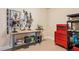 Finished workshop with storage, peg board, and workbench at 7420 S Wolff St, Littleton, CO 80128