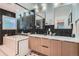 Beautiful bathroom with double vanity, herringbone tile accent wall, and modern fixtures at 2 N Jasmine St, Denver, CO 80220