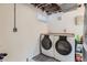 Basement laundry room area with newer washer and dryer set at 2 N Jasmine St, Denver, CO 80220