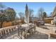 Wonderful stone patio with dining set and lounge chairs at 2 N Jasmine St, Denver, CO 80220