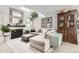 Bright and airy living room with a cozy sectional couch and a fireplace at 780 Walnut St # A, Boulder, CO 80302