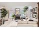 Bright and airy living room with a cozy sectional couch and a fireplace at 780 Walnut St # A, Boulder, CO 80302