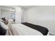 Spacious bedroom features carpet and neutral paint with a sliding mirrored closet at 6691 Hooker St, Denver, CO 80221