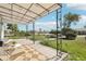 Inviting covered front porch with seating area, offering a relaxing outdoor space with views of the landscaped yard at 6691 Hooker St, Denver, CO 80221
