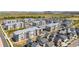 Areal community view with apartment homes, condos, single Gathering homes and convenient parking at 17767 E 54Th Ave, Denver, CO 80249