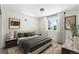 Cozy bedroom showcasing a comfortable bed, soft lighting, and serene ambiance at 17767 E 54Th Ave, Denver, CO 80249