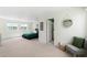 Spacious bedroom with a sitting area and ensuite bathroom at 17767 E 54Th Ave, Denver, CO 80249