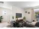 Inviting living room with a neutral color palette, stylish furniture, and modern decor, creates a cozy atmosphere at 17767 E 54Th Ave, Denver, CO 80249