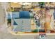 Aerial view of the property showcasing the house, backyard, and surrounding neighborhood at 3406 Purcell St, Brighton, CO 80601