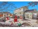 Expansive backyard featuring a patio, garden shed, and ample space for outdoor activities at 3406 Purcell St, Brighton, CO 80601