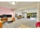 Expansive basement area featuring a desk area, storage and shelving, with ample room for activities at 3406 Purcell St, Brighton, CO 80601