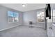 Bright bedroom with a large windows and a dedicated desk area for work or study at 3406 Purcell St, Brighton, CO 80601