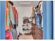 Walk-in closet featuring organized storage solutions, shelves, and clothing racks at 3406 Purcell St, Brighton, CO 80601