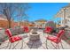 Cozy backyard fire pit area with seating, perfect for entertaining guests at 3406 Purcell St, Brighton, CO 80601