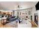 Spacious living room with comfortable seating, hardwood floors, and a cozy atmosphere at 3406 Purcell St, Brighton, CO 80601