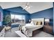 Spacious main bedroom with vaulted ceilings and a large window view at 3406 Purcell St, Brighton, CO 80601