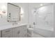 Bright, stylish bathroom featuring marble tile details, modern fixtures, and a sleek vanity at 5 Churchill Dr, Cherry Hills Village, CO 80113