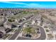 An aerial view of a block of houses showcasing their lawns and surroundings at 23757 Eagle Bend Ln, Parker, CO 80138