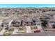 An aerial view of a block of houses showcasing their lawns and surroundings at 23757 Eagle Bend Ln, Parker, CO 80138
