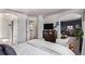 Spacious bedroom with white bedspread at 23757 Eagle Bend Ln, Parker, CO 80138