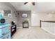 Wide upstairs hallway area with gray walls, neutral carpet, and open space to add your touch at 23757 Eagle Bend Ln, Parker, CO 80138