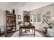 Charming home office with a wooden desk, bookshelves, and a window offering plenty of natural light at 23757 Eagle Bend Ln, Parker, CO 80138