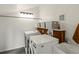 Laundry room with modern washer, dryer, and sink at 28833 Western Dr, Evergreen, CO 80439