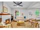 Inviting living room with a fireplace, area rug, and neutral color palette at 3002 Quitman St, Denver, CO 80212