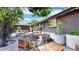Charming backyard with a stylish fire pit area and comfortable seating, perfect for outdoor entertaining at 1830 S Fillmore St, Denver, CO 80210