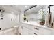 Stylish bathroom featuring a glass shower, white vanity, and contemporary accents at 1830 S Fillmore St, Denver, CO 80210