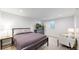 Bright bedroom with sitting area, sleek furnishings, and natural light at 1830 S Fillmore St, Denver, CO 80210