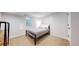 Bedroom featuring a minimalist aesthetic, natural light, and neutral tones at 1830 S Fillmore St, Denver, CO 80210