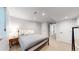 Bright bedroom with a metal bed frame, large window, and neutral carpeting for a peaceful night's sleep at 1830 S Fillmore St, Denver, CO 80210