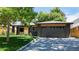 Stylish single-story home with a two-car garage and concrete driveway at 1830 S Fillmore St, Denver, CO 80210