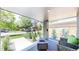 Inviting front porch with modern seating and a view of the landscaped front yard and neighborhood at 1830 S Fillmore St, Denver, CO 80210