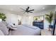 This bedroom features modern decor, recessed lighting, a ceiling fan, and ample space at 1830 S Fillmore St, Denver, CO 80210