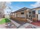Enjoy the backyard deck on this home with backyard, shed, and rock garden at 6052 Taft St, Arvada, CO 80004