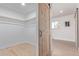 Spacious closet features hardwood floors, ample storage space and a sliding barn door at 6052 Taft St, Arvada, CO 80004