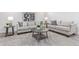 Bright living room with neutral furniture, contemporary decor, and plush carpeting at 6052 Taft St, Arvada, CO 80004