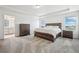 Spacious main bedroom with tray ceiling and ensuite bathroom at 16595 E 110Th Ave, Commerce City, CO 80022